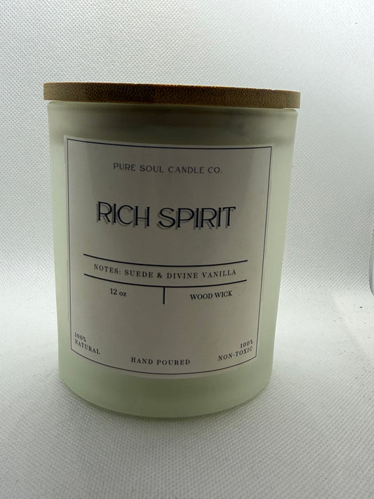 Candle with 'Rich Spirit' label on a white background